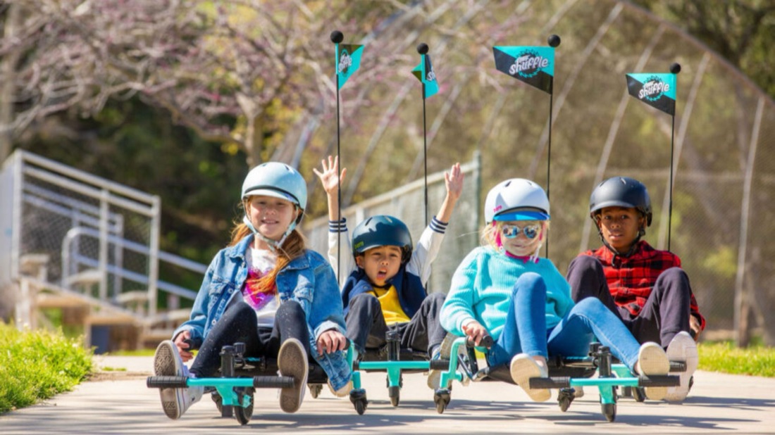 Kids riding Razor Crazy Cart Shuffles together