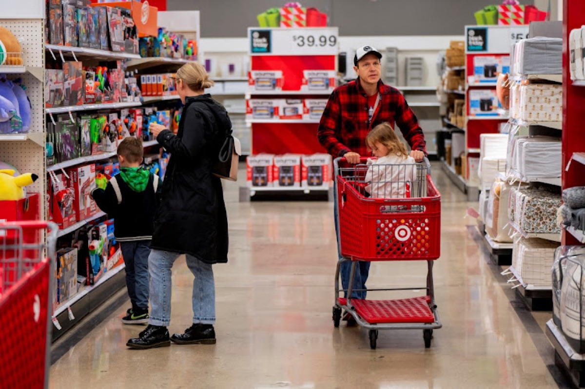 A family shopping the aisles of a major retail store