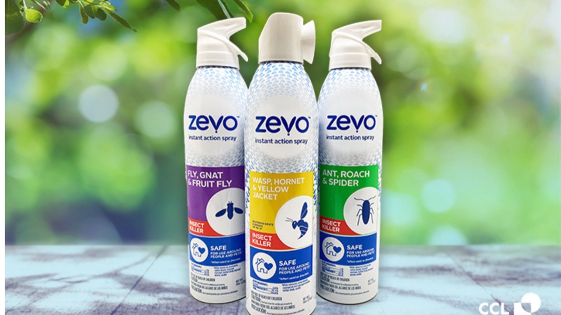 Three Zevo instant action sprays displayed outdoors
